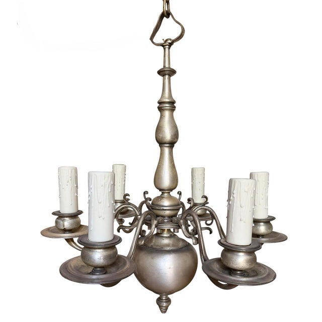 This vintage 6-light silver chandelier will add classic charm to any style home. Perfect in a dining room, master bathroom...