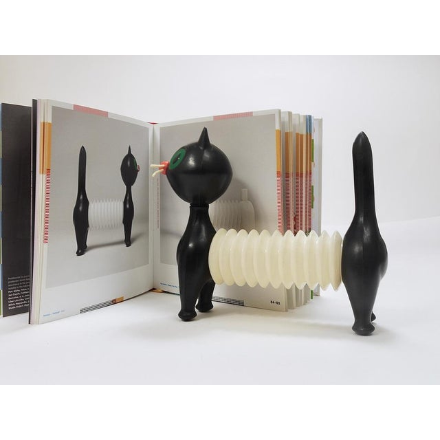 A charming Classic vintage plastic squeaky toy cat „Liba, the tomcat“ with accordion body, designed in 1963 by Libuse...