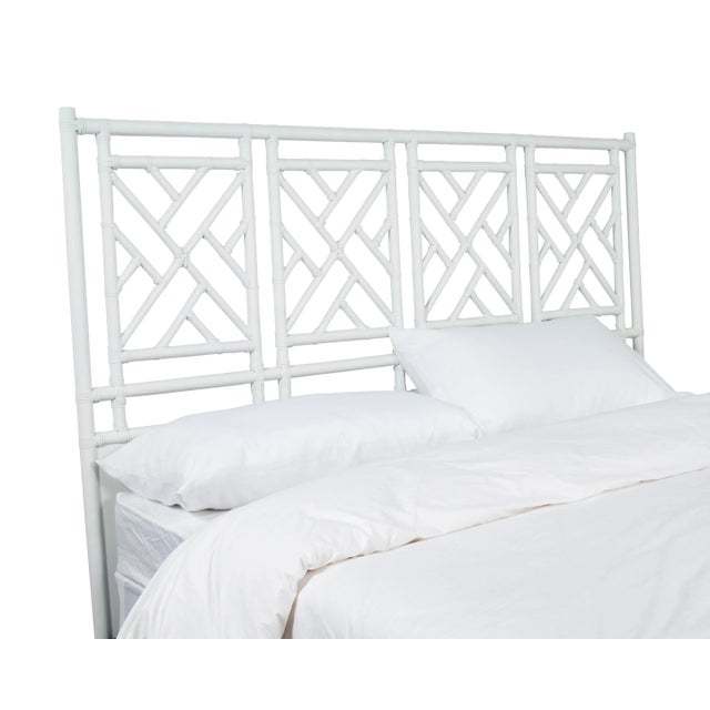 This headboard features classic Rattan design in a geometric pattern. Constructed of solid rattan and hand bound with...