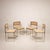 This elegant set of four SQ-AL model chairs perfectly embodying the refined and architectural aesthetic that characterizes...