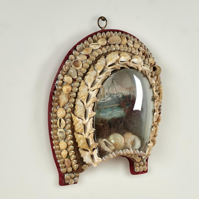 Enchanting 19th century English sailors valentine handcrafted in exotic seashells, in horse shoe form, lovingly arranged...