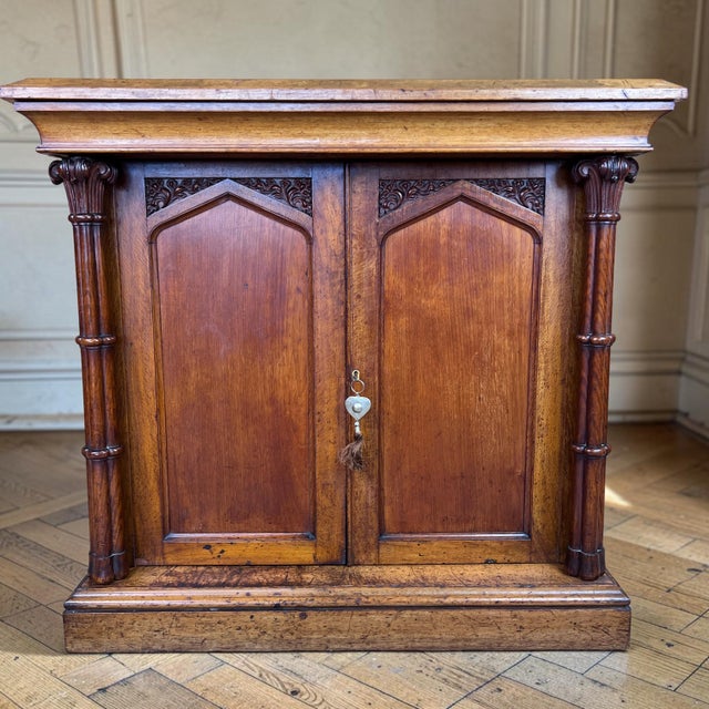 A weighty and well-proportioned william iv oak gothic revival taste and dating to around 1830. The top has a moulded edge...