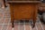 This is an antique chamber pot cupboard from England. I believe it is oak & it is on castors. Single metal latch for the...