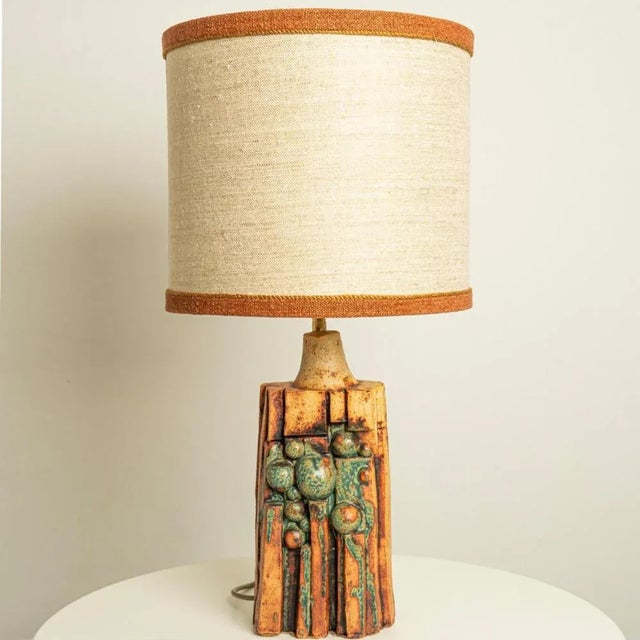 A rare ceramic table lamp by Bernard Rooke, England, 1960s. Sculptural piece, made of handmade ceramic in natural tones of...