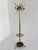 This impressive vintage Italian brass hall tree combines practical functionality with luxurious decorative appeal....