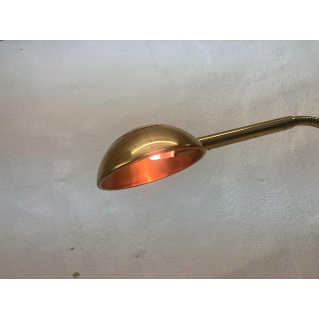 Multi-adjustable Florian Schulz floor lamp from the 1970s and 1980s, model Yon, halogen socket. Brass. Good used...