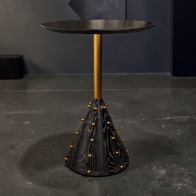 Designed by Ashley Childers for Global Views, the “Spheres” Drink Table is a sculptural statement piece that blends bold...