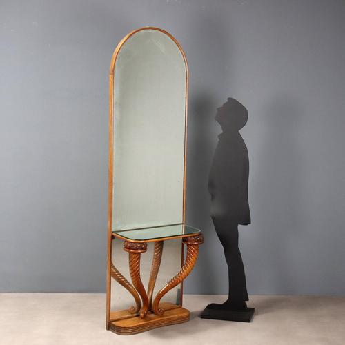 Oak console table. Wall mirror with mirrored console table top, supported by a pair of cornucopias with carved fruit...