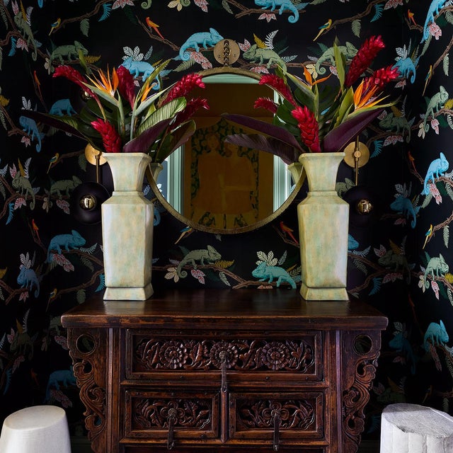 Used as a family altar table or for general storage, this antique Chinese coffer table is hand-carved in low relief with...