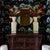 Used as a family altar table or for general storage, this antique Chinese coffer table is hand-carved in low relief with...
