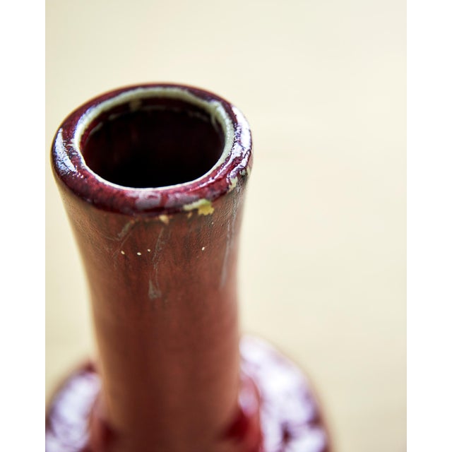 Classic bottle shape Chinese vase with Sang de Boeuf glaze, {aka oxblood or burgundy.. This vase is reproduction of an...