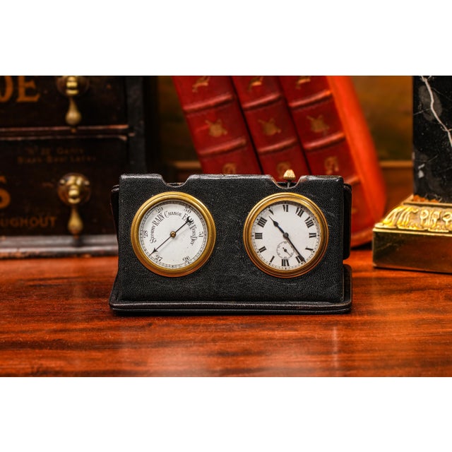 Journey back to the turn of the century with this exquisite circa 1900 travel desk clock and barometer set, elegantly...