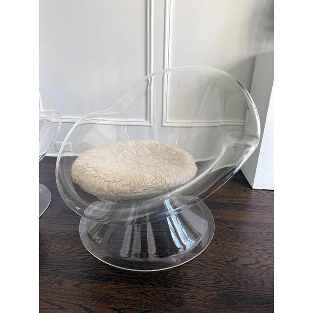 A pair of "Daffodil" Lucite lounge chairs by designed by Erwin & Estelle Laverne for Laverne International. One of the...