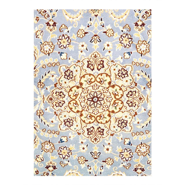 Nain rugs are renowned for their detail and fine use of outlining along the central motifs. Breaking from the classical...