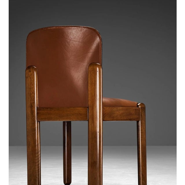 A splendid set of high-end dining chairs, an authentic expression of Italian modernism, designed by renowned designer...