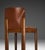 A splendid set of high-end dining chairs, an authentic expression of Italian modernism, designed by renowned designer...