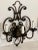 Stunning pair of Italian hand wrought iron sconces with a blackened rust finish. Crafted in early 2000s but have never...