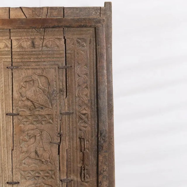 Antique Indian Carved Teak Wood Gate Panel on Iron Stand, probably one of two panels which were possibly gates. In sun...