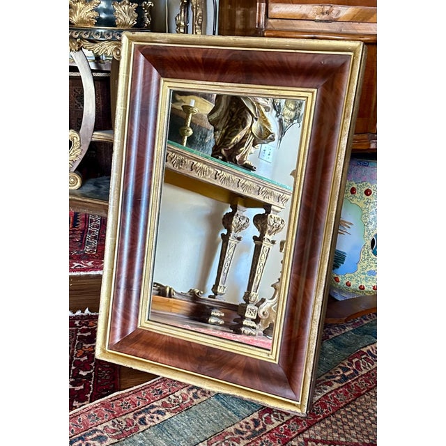 Early 19th Century American Empire Mahogany and Gilt Ogee Wall Mirror American Empire Period mahogany wood and gilt ogee...