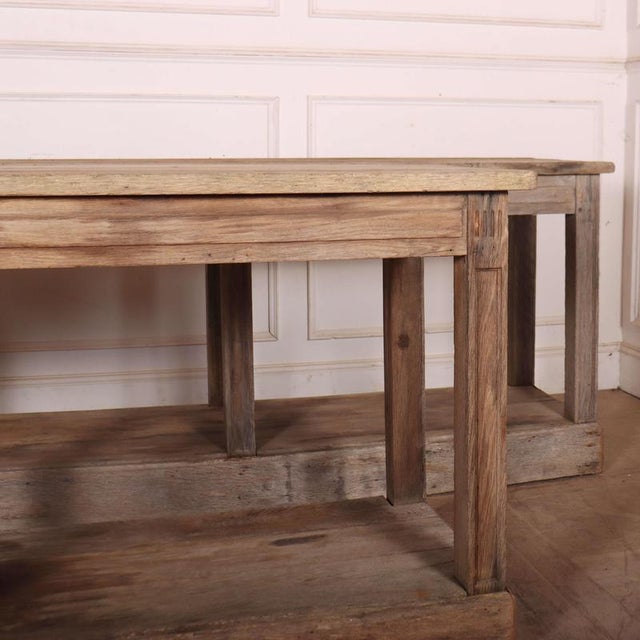 Interesting pair of 19th C French rustic bleached oak console tables. 1830. Dimensions:W: 198cm (78")H: 85cm (33.5")D:...