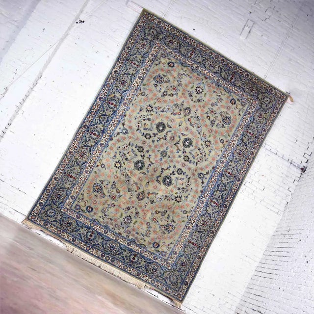 Handsome large 12’3” x 8’ 9.5” handmade Persian wool Tabriz style rug with a light teal green ground and blue, red, pink,...