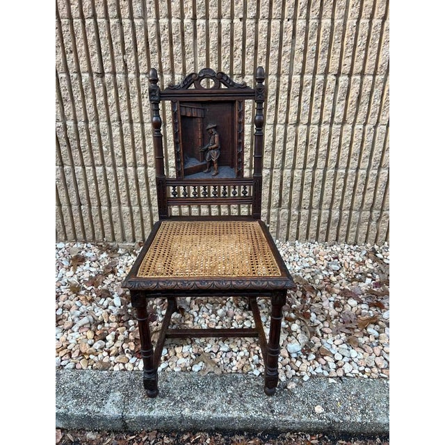 French Country Early 20th Century Pair of Antique French Renaissance Style Carved Cane Seat Brittany Side Chairs For Sale - Image 3 of 12