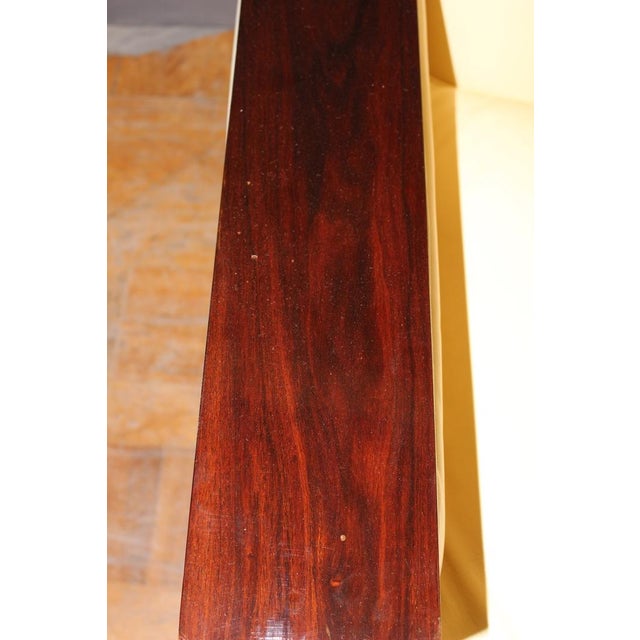 Pair of Art Deco style armchairs in beige leather and rosewood, seat height 43 cm, finish of varnished wood, set in good...