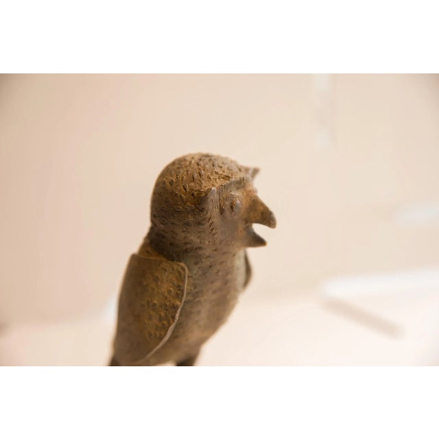 :: Vintage handmade African owl sculpture. Circa late mid 20th century, though possibly older, this piece has such...