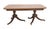 Duncan Phyfe style drop leaf table in dark wood tones. The tripartite (three-legged) bases that feature urn-shaped pillars...