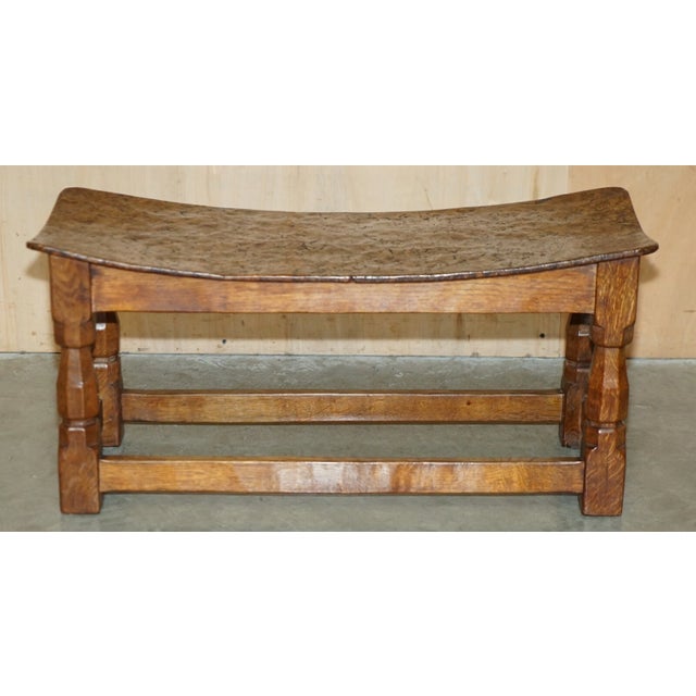 An exceptionally important and museum-quality 1930s English antique burr oak bench stool by the famed craftsman Robert...