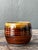 This vintage brown studio pottery bowl is a handsome example of mid-20th-century handcrafted ceramic design, celebrating...