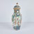 A pair of six sided, beautifully hand-painted covered porcelain vases featuring traditional figures and flowers, all...