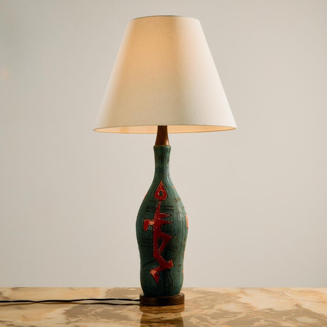 A truly rare piece of fine and applied art. The ceramic lamp from the 1970s designed by artist Jiří Georges Lauda and...