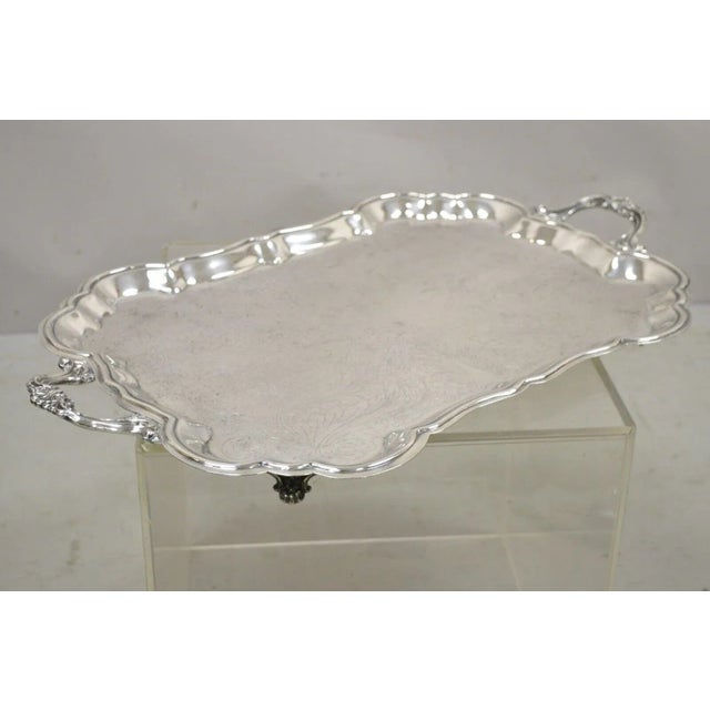 Vintage WM Rogers Victorian Style Silver Plated 28" Twin Handle Serving Platter Tray. Item features raised on ornate feet,...