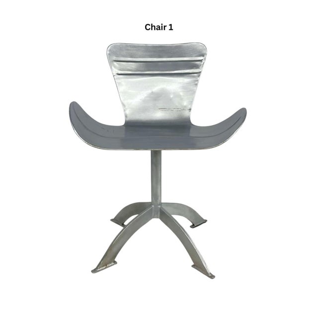 These two (2) unique, sturdy chairs are made of thick industrial steel sheeting, and the design is sleek and stylish. The...