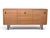 A beautifully restored Mid-Century Modern walnut credenza that showcases the clean lines, exceptional craftsmanship, and...