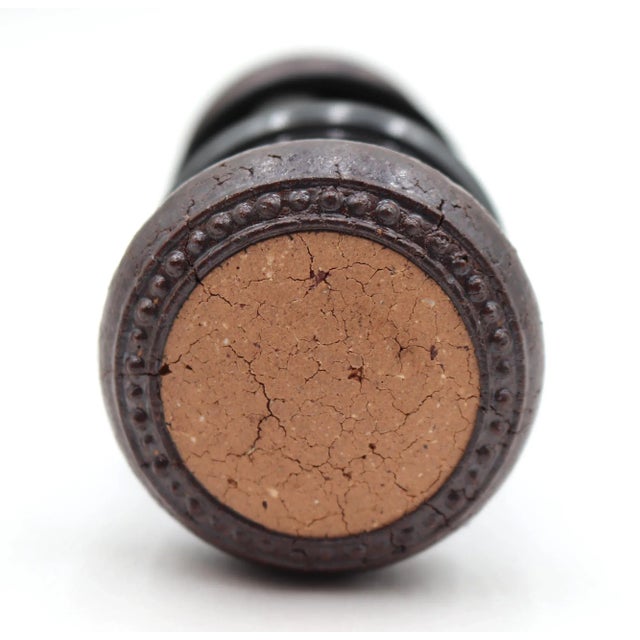 This vintage passage door knob set includes two brown and tan cork door knobs with a beaded design and two black finish...