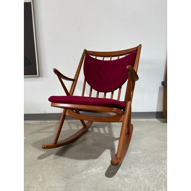 Classic Danish design and simplicity in this Bramin teak rocker by Frank Reenskaug. The fuchsia upholstery is a great...