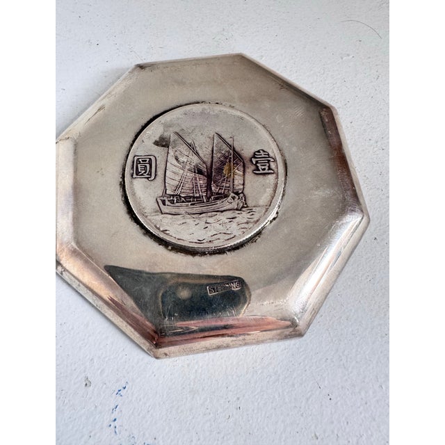 This is an antique Chinese export silver coin dish / trinket tray featuring a vintage silver coin inset into the base with...