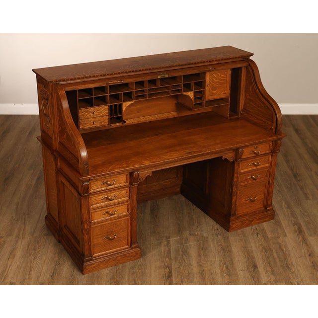 High Quality American Made Quarter Sawn Oak Roll Top Desk. Features A Classic Roll Top Tambour Opening To A Fully Fitted...