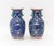 Pair of Chinese Famille Rose Porcelain Baluster Vases, each hand-enameled with si bat and scrolling floral motif on a...