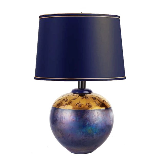 Elegant vintage table lamps with a gorgeous reflective, irredescent finish. Vibrant cobalt blue spherical body with wide...