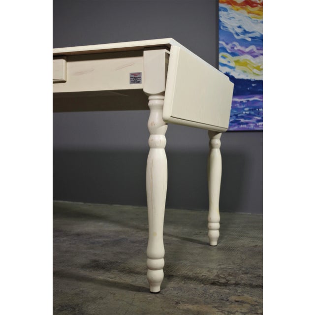 Table with extensions in brushed spruce décapée stained aged, turned legs and removable Table width closed: 120 cm Table...