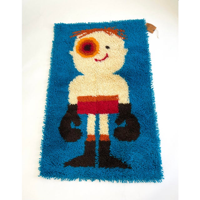 This adorable boxer is victorious despite his black eye. This is an original 1970s Ege Rya "Kids Collection" wall tapestry...