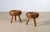 An exceptional and highly collectible pair of mid-century modern three-legged stools (frequently utilized in modernist...