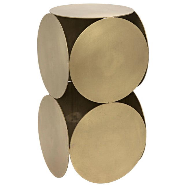 Antiqued brass circles carefully welded to form an inviting metal side table.