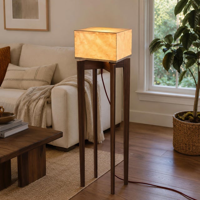 Handmade floor lamp by Live One's, Wake Forest, North Carolina. A hand-stitched natural rawhide cube shade (10 x 10 x 6...