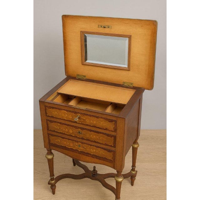 Period: 19th century Style: Napoleon 3rd Condition: Good condition Material: Marquetry Width: 39Height: 75Depth: 26