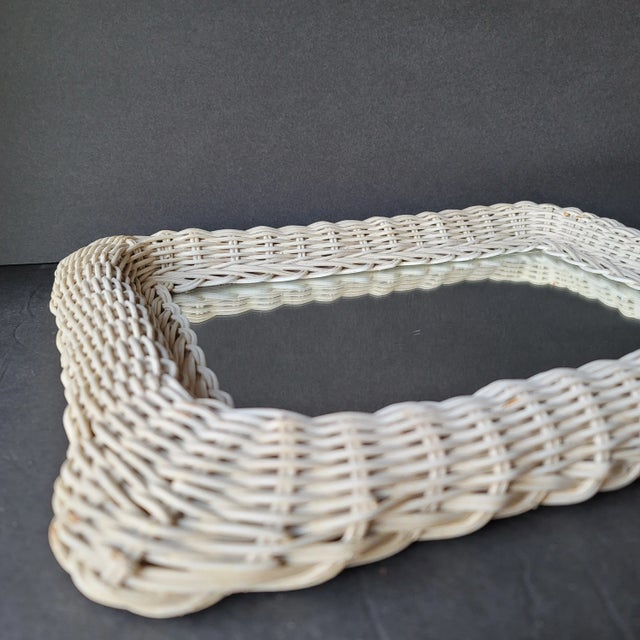 Vintage 1950's Rectangular White Mid Century Modern Wicker Wall Mirror Frame measures approx 16.5" high x 12.5" wide...