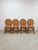 This lovely set of four vintage cane and rattan round dining chairs with cushions are a warm and beautifully crafted...